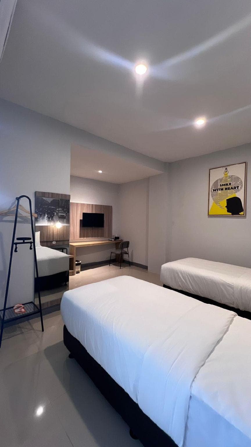 Darmo Inn By News Hotel photo 2